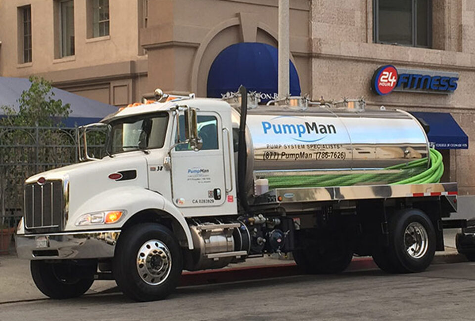PumpMan 2500 Gallon Vacuum truck parked on street