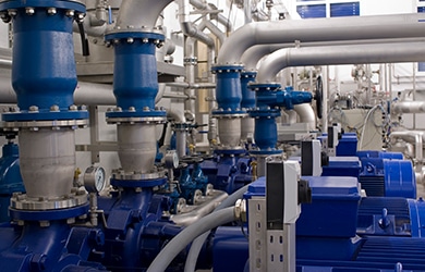 water pump system with blue pumps and silver pipes