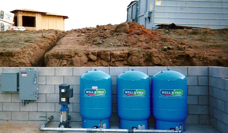 three Well-X-Trol Tuf-Kote tanks in residential construction site